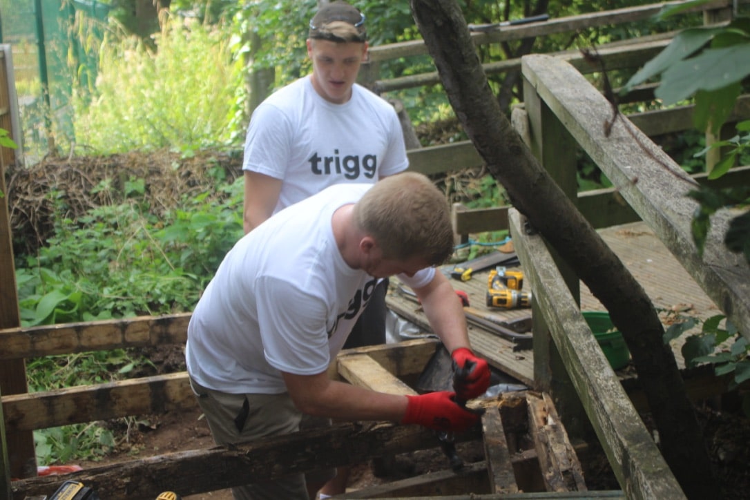 Team working on rebuilding structures in the playground